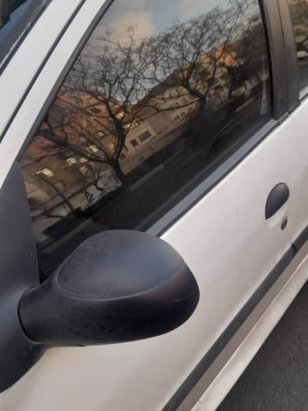 شیشه درب پژو 206